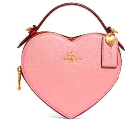 heart shaped coach crossbody bag.